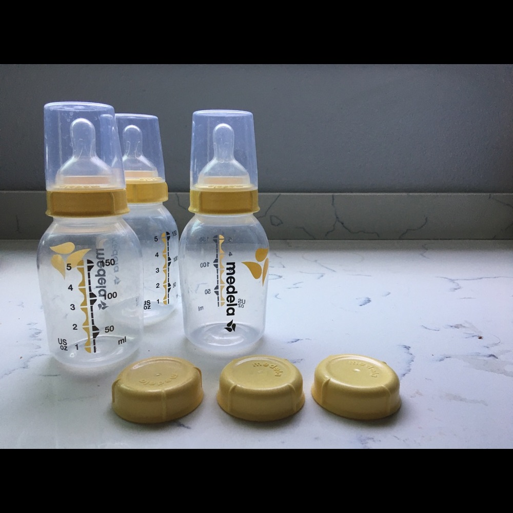three 5oz medela bottles
